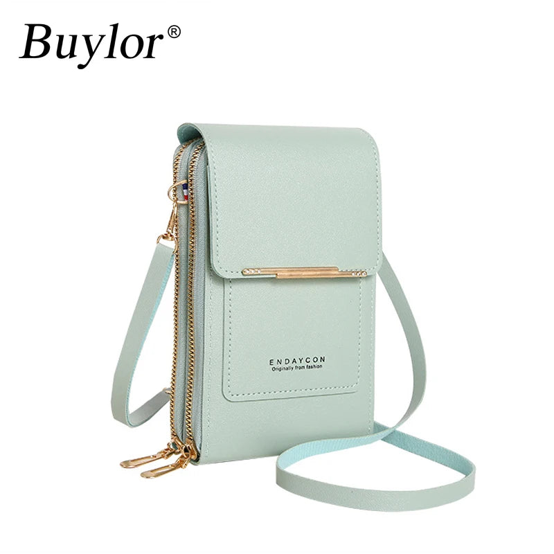 Bolsa Crossbody . Possui um compartimento especial para celular com tela sensível ao toque, permitindo o uso do celular sem precisar tirá-lo da bolsa.